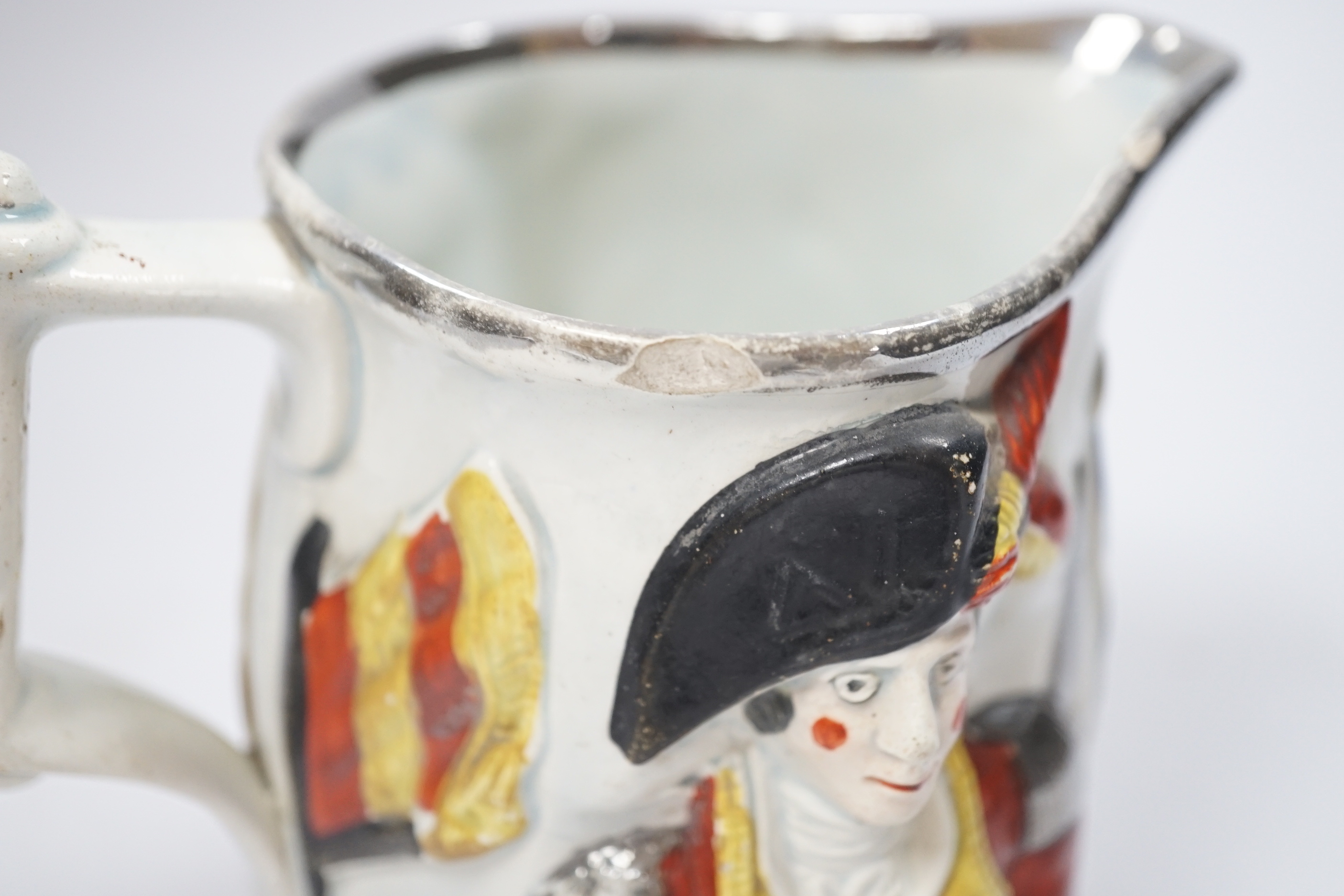 An early 19th century pearlware Lord Wellington / General Hill relief-moulded commemorative jug, 14cm